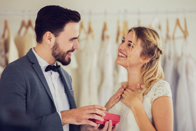 Cheerful couple at wedding ceremony