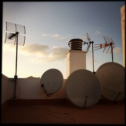 Low angle view of street light against sky