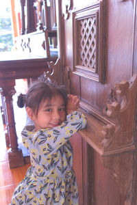 Portrait of smiling girl at home