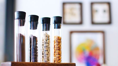 Close-up of coffee beans in containers