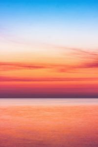 Scenic view of sea against dramatic sky