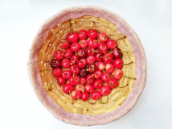 High angle view of strawberries in bowl on table