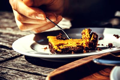 High angle view of person preparing food on table