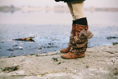 Low section of woman in water
