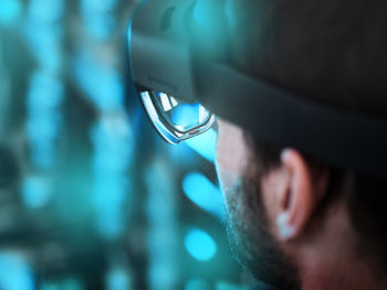 Technician wearing augmented reality glasses in industry