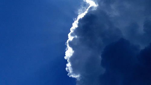 Low angle view of clouds in blue sky