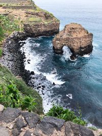 High angle view of rock formation on sea shore