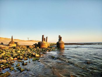 Scenic view of sea against clear sky