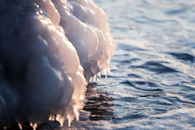 A beautiful frozen salt water on the beach of baltic sea. ice formations in winter.