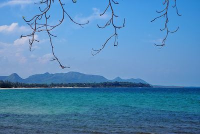 Scenic view of sea against blue sky