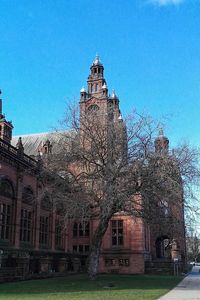 Low angle view of church against blue sky