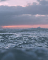 Scenic view of sea against sky at sunset