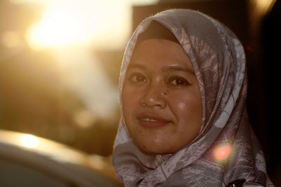 Close-up portrait of mid adult woman wearing hijab