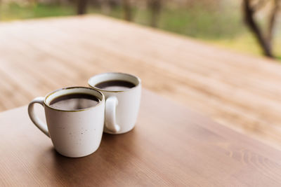 Close-up of coffee cup on table