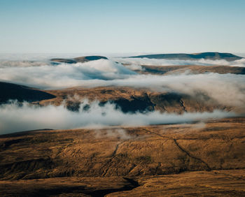 Scenic view of volcanic landscape against sky