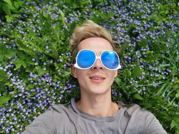 Portrait of smiling man wearing sunglasses