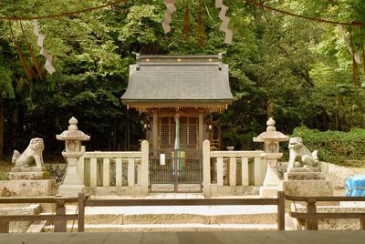 View of temple against building