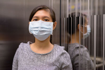 Portrait of woman wearing mask