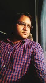 Mid adult man in eyeglasses