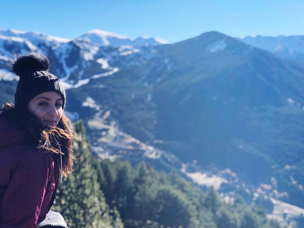 PORTRAIT OF WOMAN IN MOUNTAINS