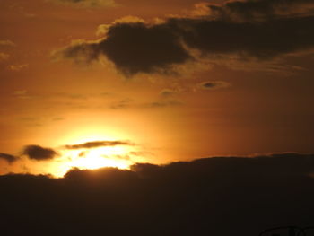 Scenic view of dramatic sky during sunset