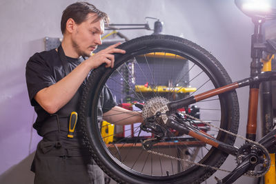 Man working on bicycle