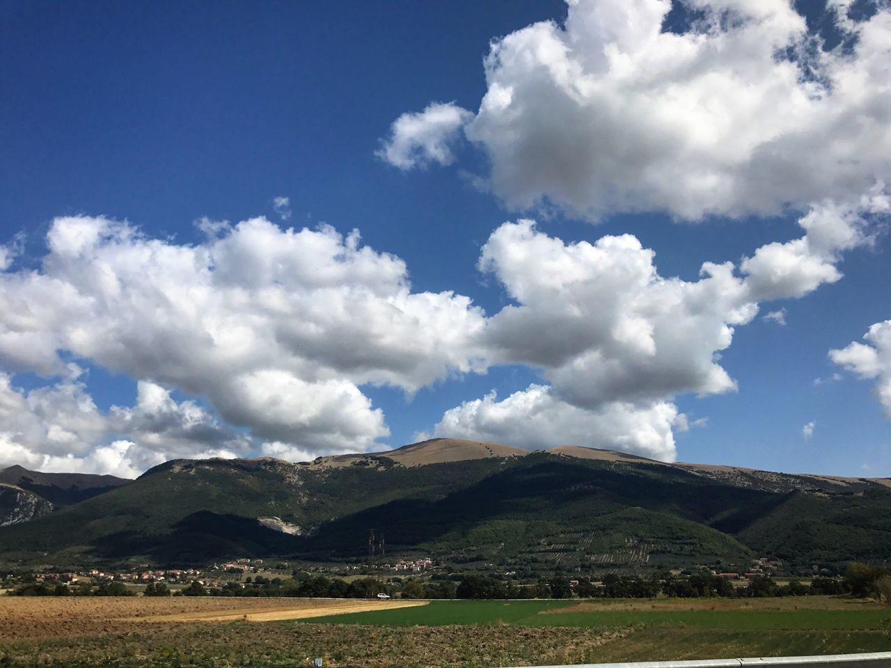 mountain, landscape, nature, scenics, sky, beauty in nature, day, tranquility, tranquil scene, cloud - sky, field, outdoors, no people, mountain range, scenery