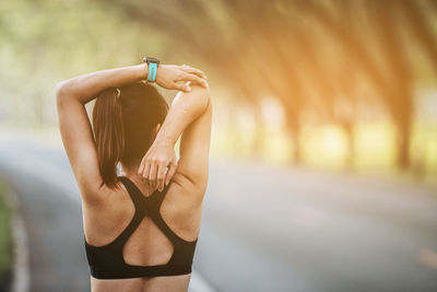 Low section of woman with hands