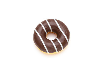 Close-up of chocolate cake against white background