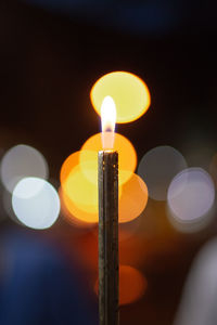 Close-up of lit candles