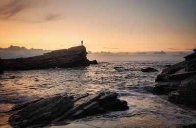 Scenic view of sea against sky during sunset