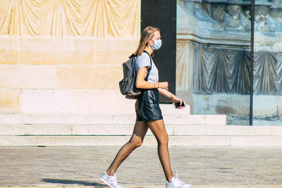 Full length of woman running