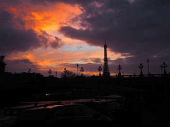 Road against cloudy sky at sunset