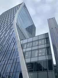 Low angle view of modern buildings against sky