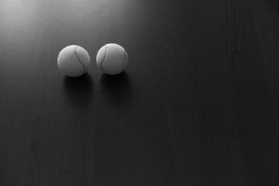 High angle view of tennis balls on table