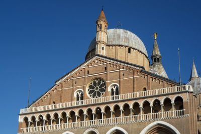 Low angle view of cathedral against clear blue sky