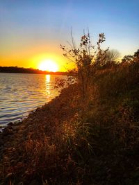 Scenic view of sea against sky during sunset