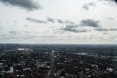 High angle view of city buildings against sky