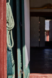 Close-up of clothes hanging on window