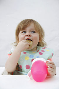 Portrait of a girl eating food