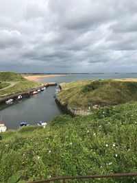 Scenic view of river against sky