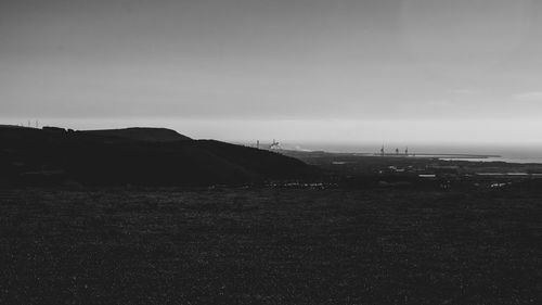 Scenic view of land against sky