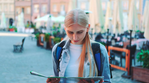 Young woman using mobile phone