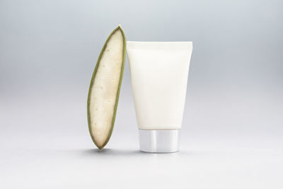 Close-up of drink against white background