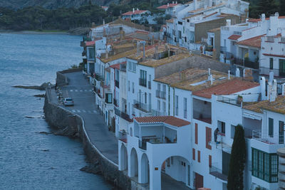 High angle view of townscape by sea riva pitxot cadaquès alt empordà. girona. spain.