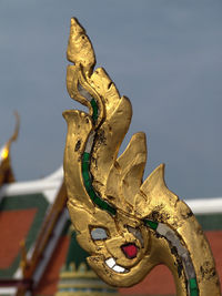 Low angle view of statue against sky