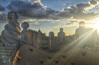 Cityscape against sky during sunset