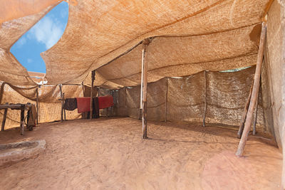 Tent hanging on rock