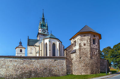 View of church of st. catherine and castle in kremnica, slovakia