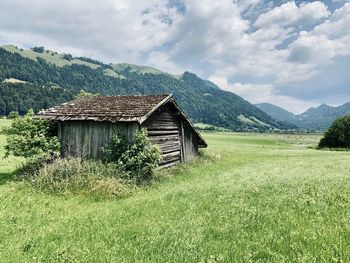 House on field against sky